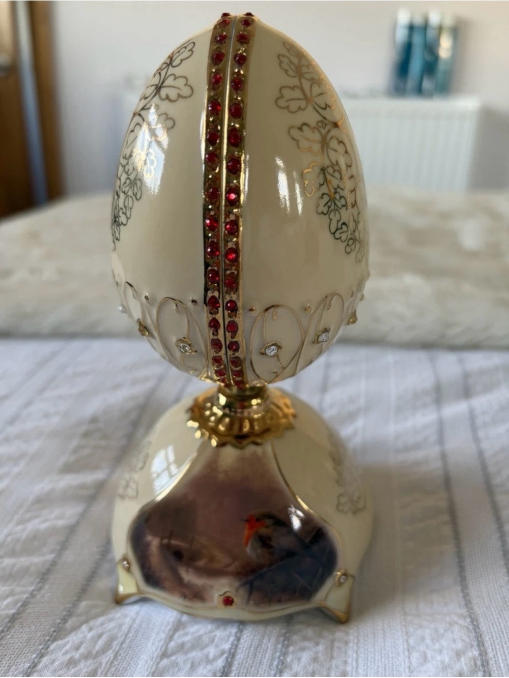 a Jewel of Nature Robin Musical Egg music box from the Bradford Exchange.